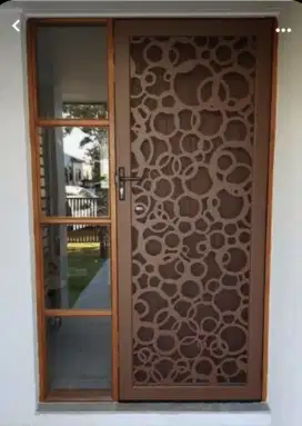 Teralis pintu motif cutting