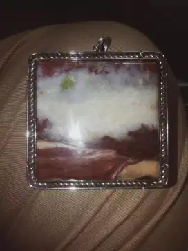 liontin batu gambar pemandangan