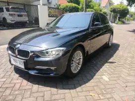 BMW 320i AT 2013 hitam km 49 ribu record Astra