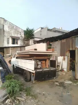 Jasa pindahan kontrakan pakai mobil engkel bak