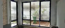 Tukang pintu alumunium