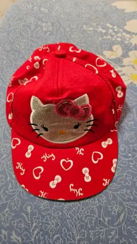 Topi anak preloved  Hello Kitty merah