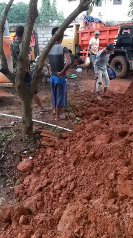 Tanah merah campur pengurugan buang puing sampah urugan