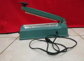 Mesin Press Plastik Xander