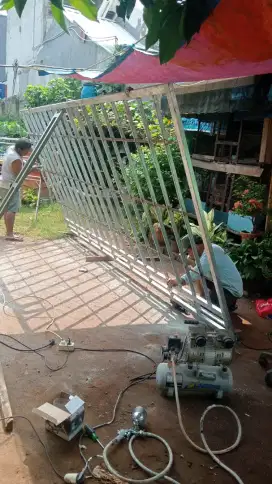 Pembikinan pager dlln renovasi rumah