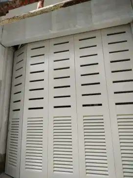 pintu garasi sleeding/tikung