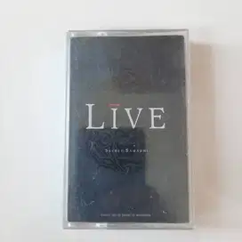 Kaset Pita: Live. album: Secret Samadhi