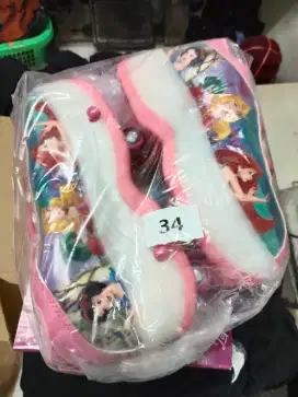 Sepatu 4 roda pink