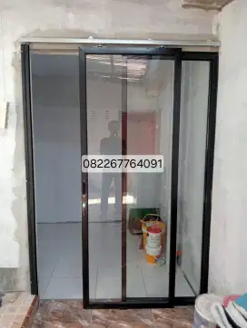 Pintu kaca alumunium