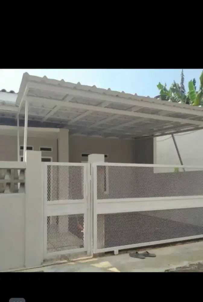 Pagar plat lubang perforated dengan model minimalis