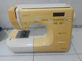 Mesin jahit dan vacuum sealer