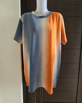 kaos gradasi abu oren baru