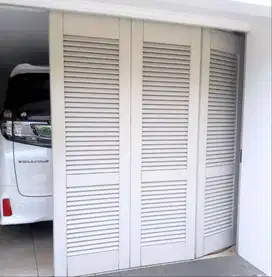 Pintu garasi rumah minimalis, berkualitas bandung jaya steel