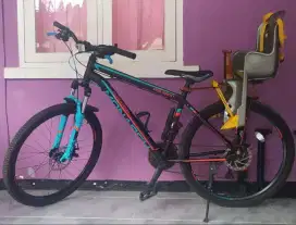 Polygon monarch M5 dengan Boncengan anak