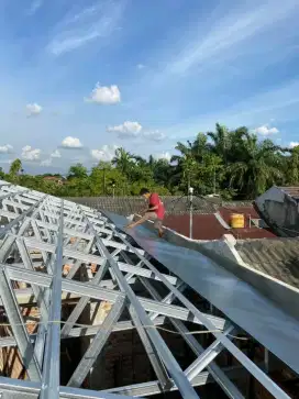 Bongkar pasang atap lama ganti baja ringan dan pasang baru