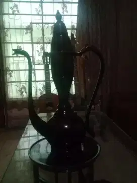 Teko bahan kayu siap pajang.
