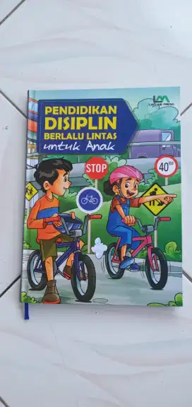 BUKU EDUKASI TERTIB BERLALU-LINTAS UNTUK ANAK SEKOLAH