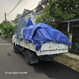 Jasa pindahan barang rumah kontrakan menggunakan truk engkel bak