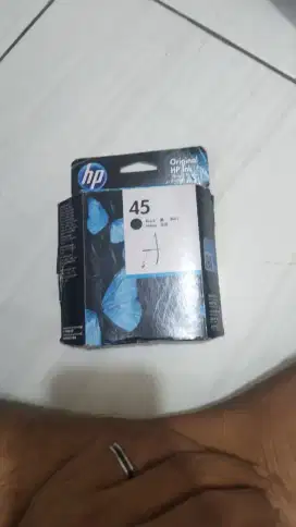 Menampung tinta cartridge baru dan bekas