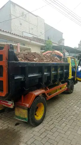 Buang puing bangunan
