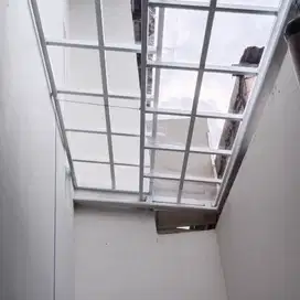kanopi sledng atap solar flat