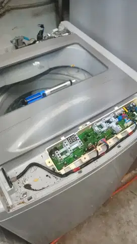 Servis mesin cuci dan pengering spesialis bergaransi