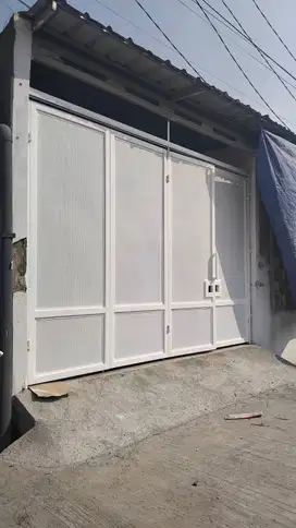 pagar rumah plat bolong