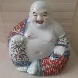 Patung Smiling Budha
