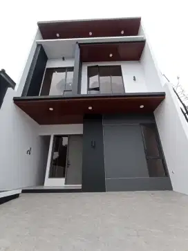 Dijual rumah minimalis modern 2 lantai ada rooftop di kota wisata