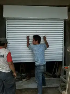 Rolling door folding gate kusen aluminium