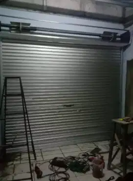 Rolling door folding gate kusen aluminium