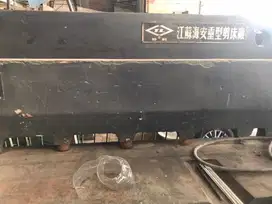 Mesin potong plat besi
