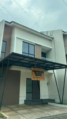 Disewakan atau dijual rumah 2 lantai dekat Kencana Loka BSD