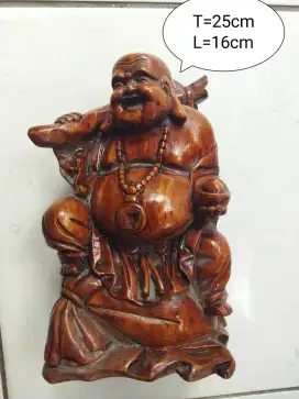 Buddha bahagia ukiran