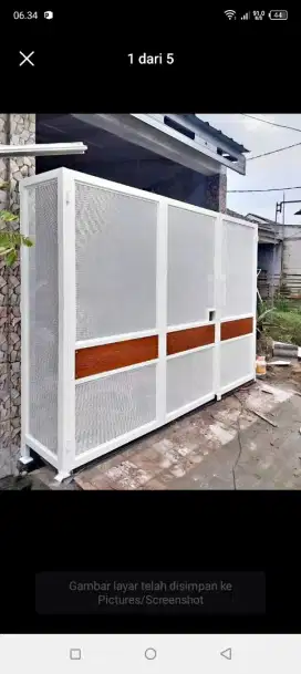 Pintu dorong plat bolong bolong
