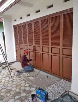 Pintu lipat garasi dan ruko bahan galvanis anti karat bergaransi