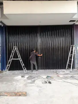 Folding gate rolling door