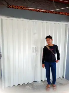 Folding gate rolling door