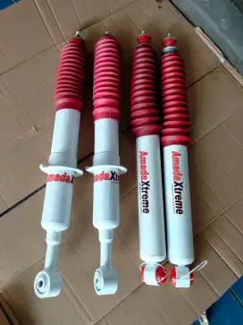 Shock absorber buat mobil Toyota Fortuner merk Amada exteam depan blkg