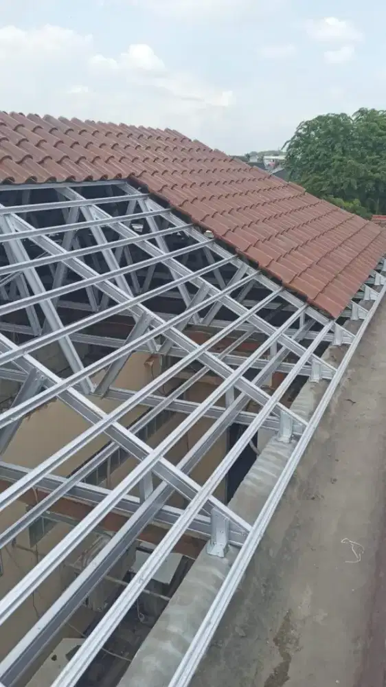 1 PAKET RENOVASI ATAP LAMA GANTI BAJA RINGAN