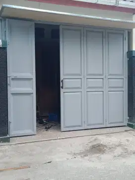 pintu Lipat Plat Besi untuk Ruko Rumah Toko