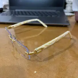 kacamata cartier rimless