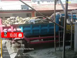 Buang puing depok