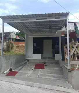 Kanopi teras rumah dan perkiraan dari baja ringan atap galvalum pasir
