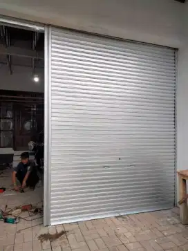 Roling door folding gate