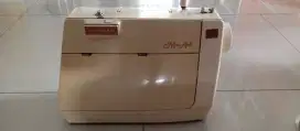 Mesin jahit portable singer mon ami langka
