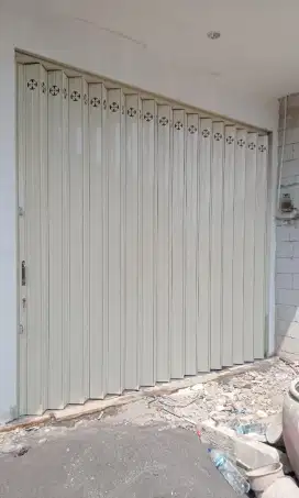Pintu harmonika murah toko garasi