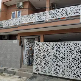 pagar rumah cutting laser motif kembang