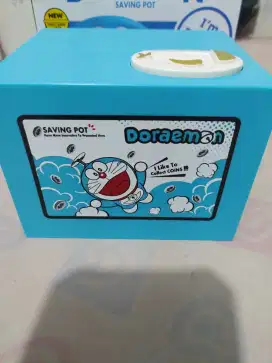 Mainan anak celengan koin doraemon