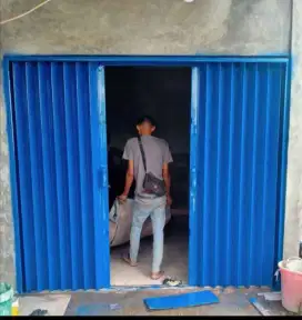 Folding gate rolling door